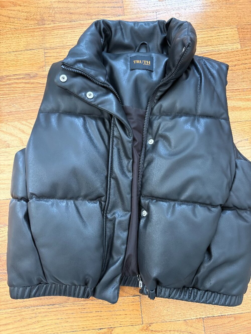 Puffy black Truth vest